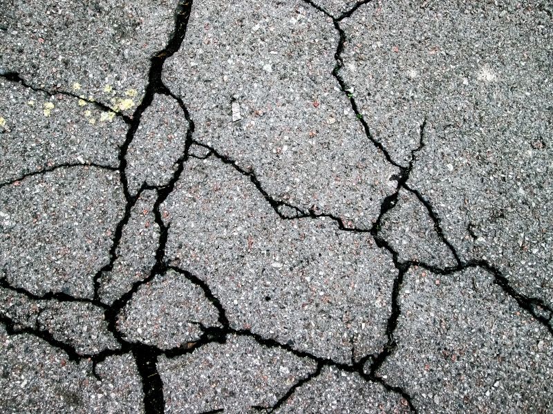 Cracked Asphalt Before Sealing